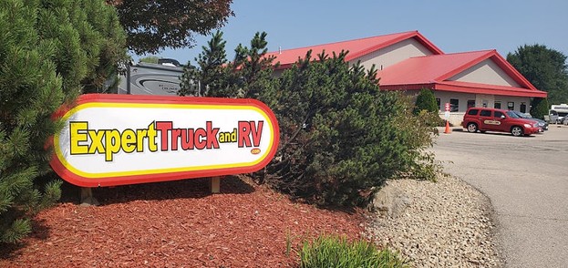 Sign reading, "Expert Truck & RV"